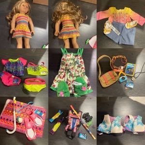 American Girl Doll Lea along with clothing and accessories.